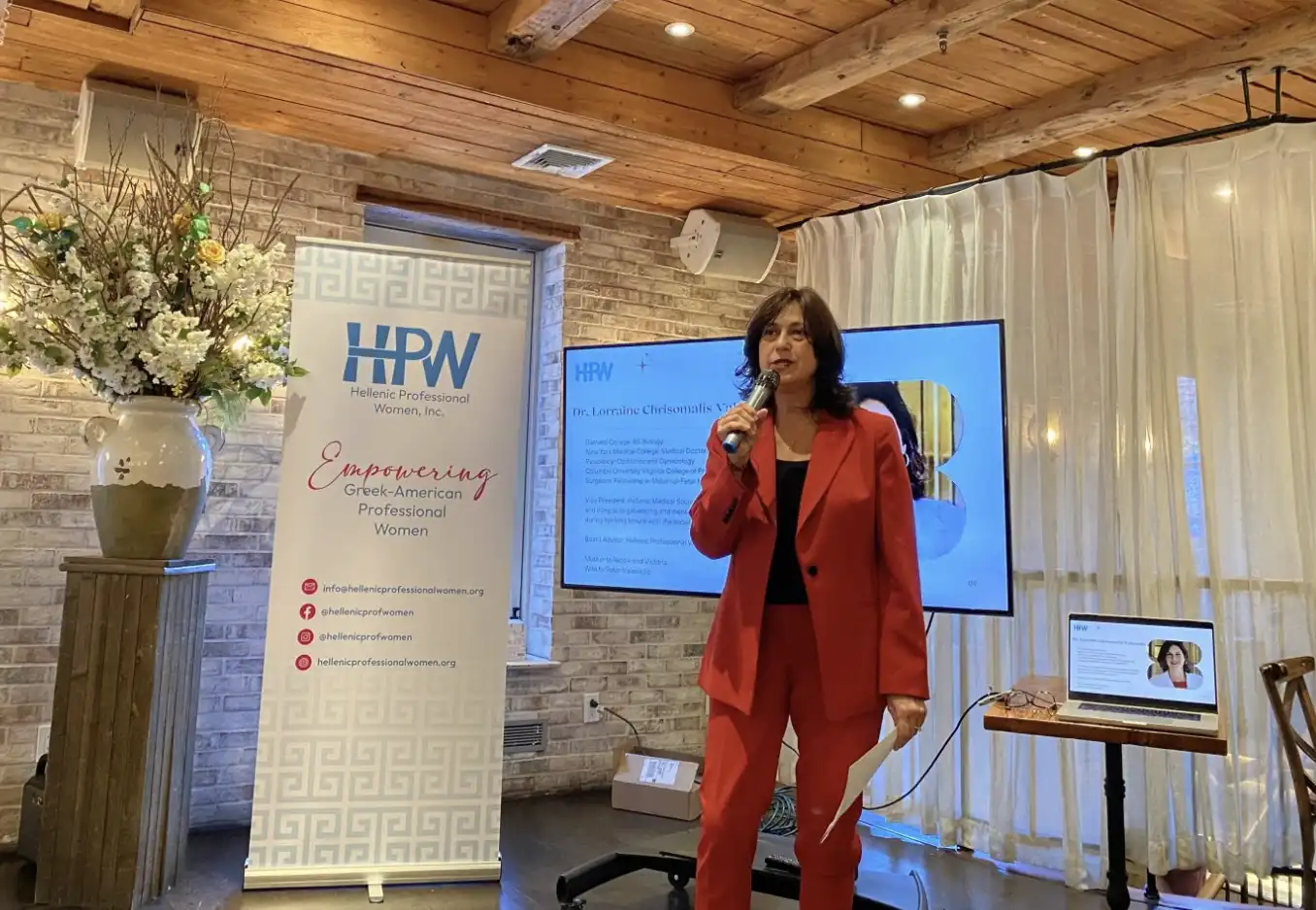  Dr. Lorraine Chrisomalis-Valasiadis speaking at HPW event 